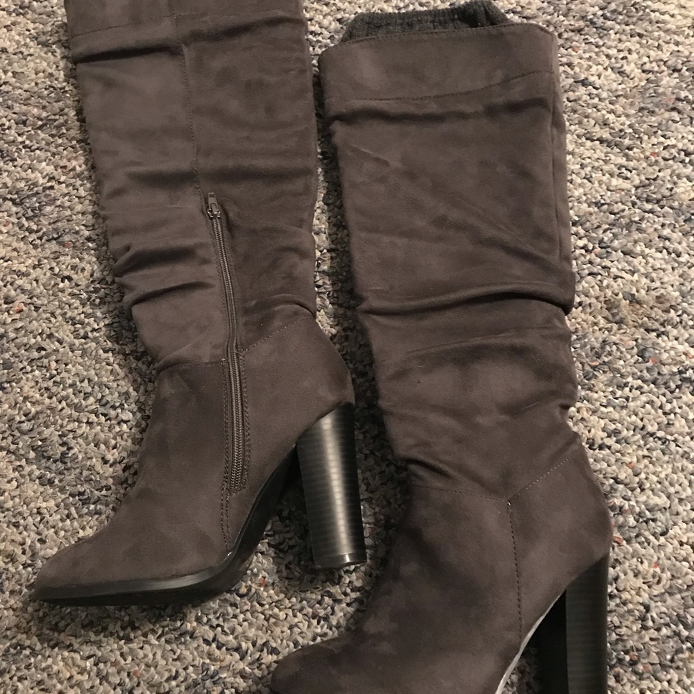 Knee high heeled boots